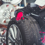 demo-attachment-241-replacing-car-tires-F6SZJYW